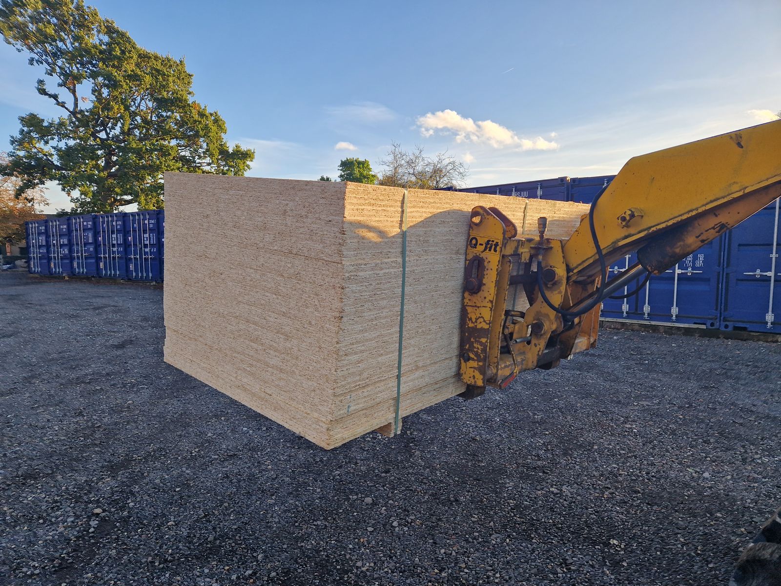 Telehandler moving a large load across the CamStorage yard